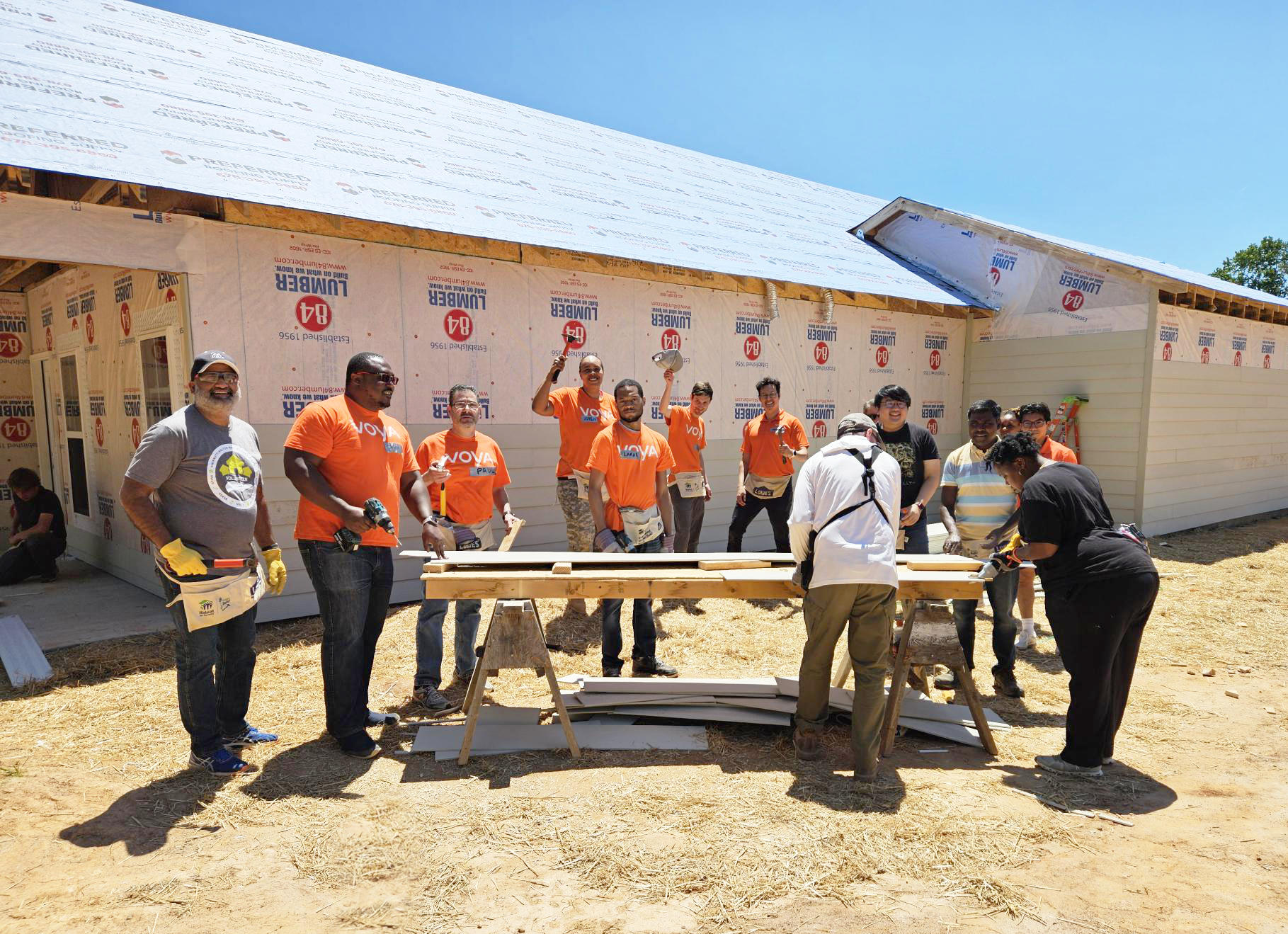 Members of the Voya Financial team help out on a home build.