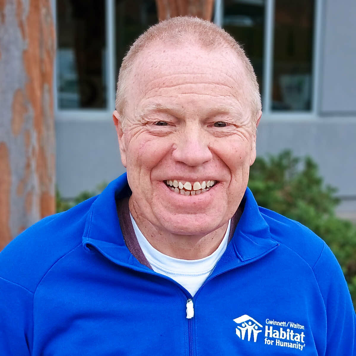 A photo of Scott Funk, our Volunteer Coordinator, outside of the Gwinnett/Walton Habitat for Humanity offices.
